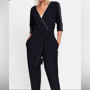 Zara crossover black jumpsuit w/ white piping and tie at the waist sz large